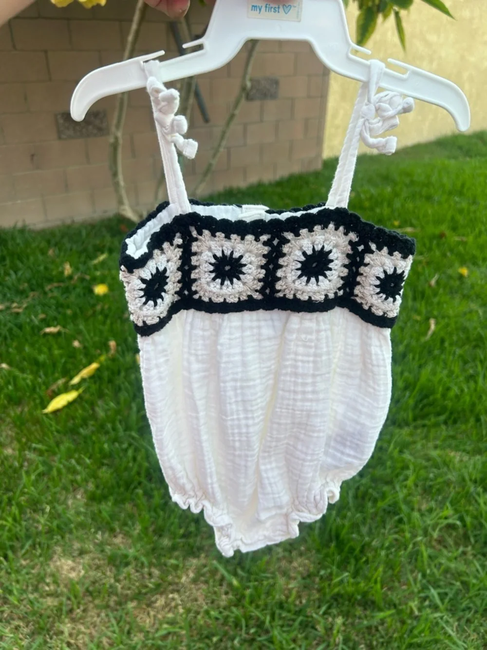 Old Navy White Baby Romper with Black and Cream Crochet Trim